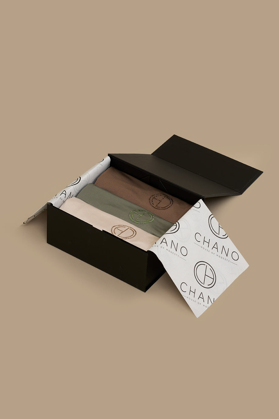 Surprise yourself or your loved one with the luxurious hijab gift box with magnetic closure. The perfect gift for a new hijabi, Ramadan or Eid. The gift box contains 3 hijabs of your choice from our Satin Jersey collection.