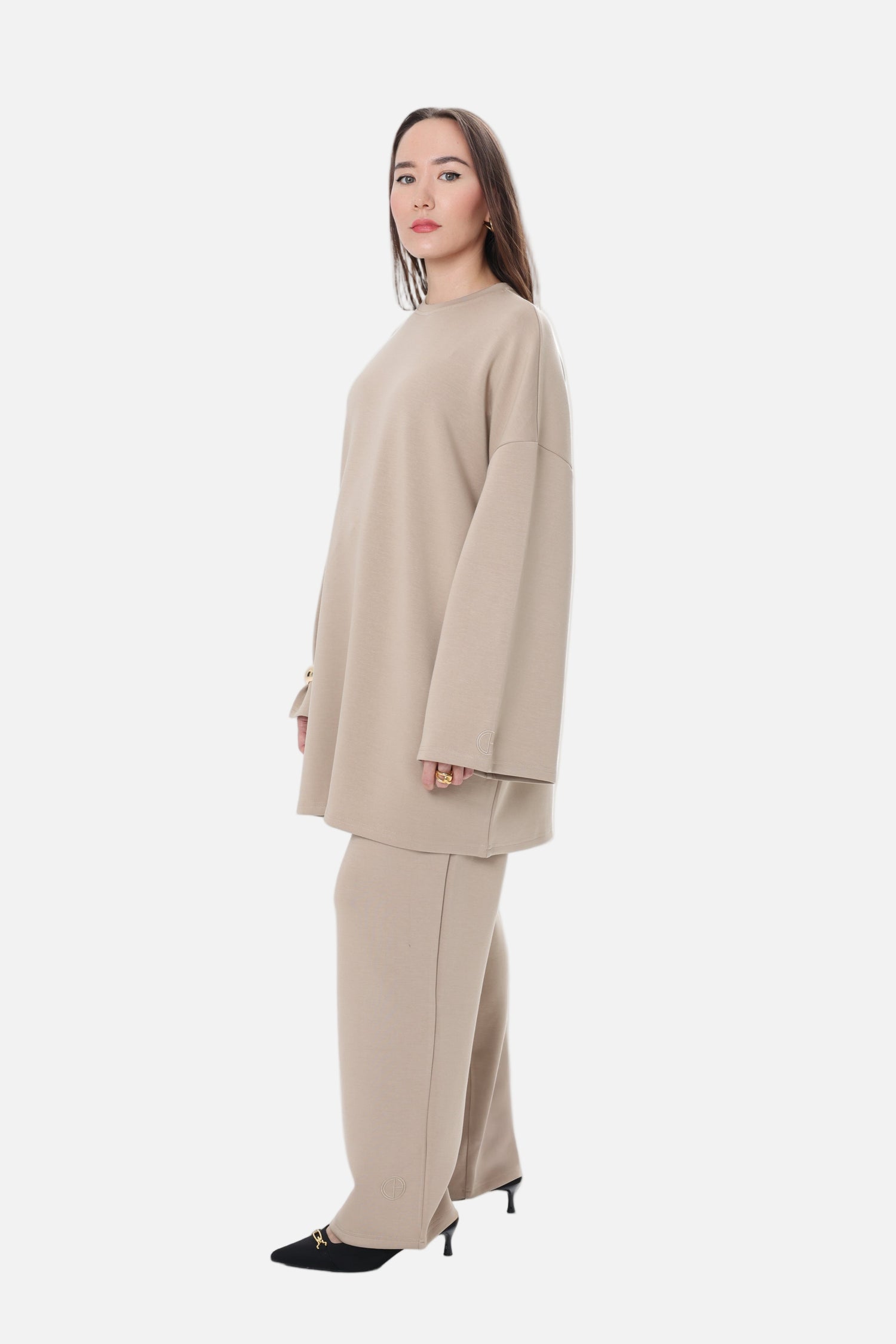 Side view of the Comfy Two-Piece Set in Sand by CHANO Modesty, showing relaxed oversized tunic and modest wide-leg trousers.
