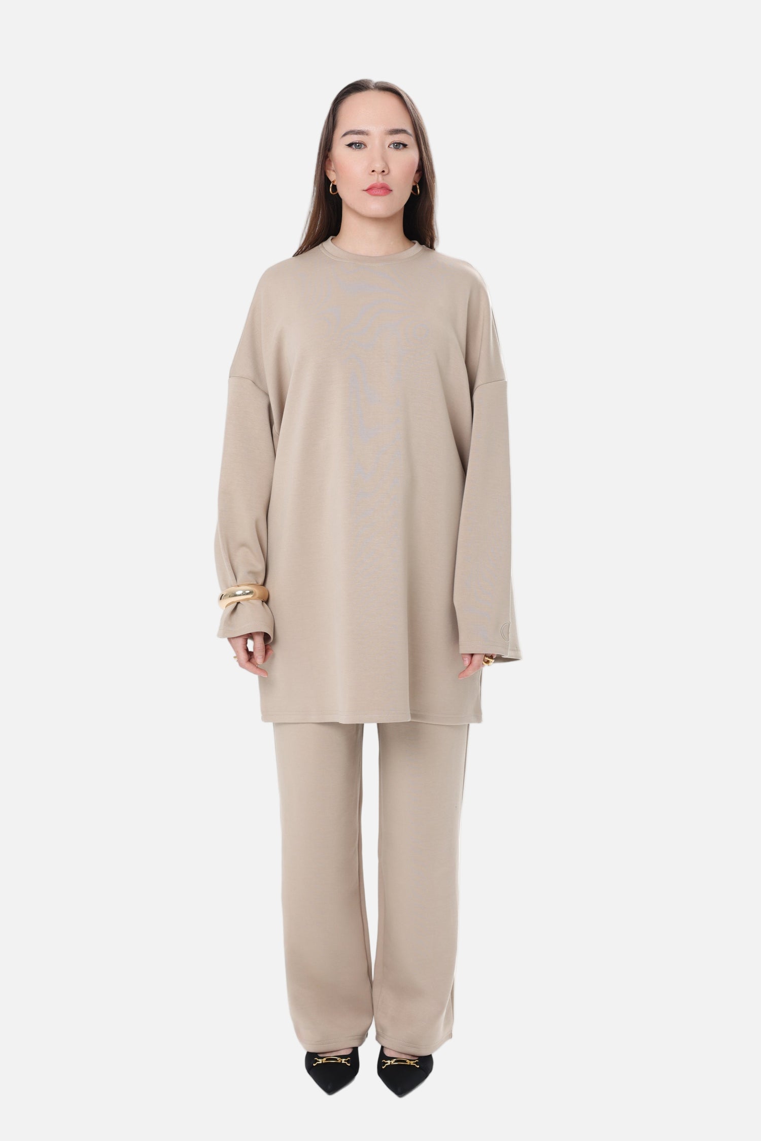 Model wearing the CHANO Modesty Comfy Two-Piece Set in Sand, featuring an oversized tunic top and wide-leg trousers.