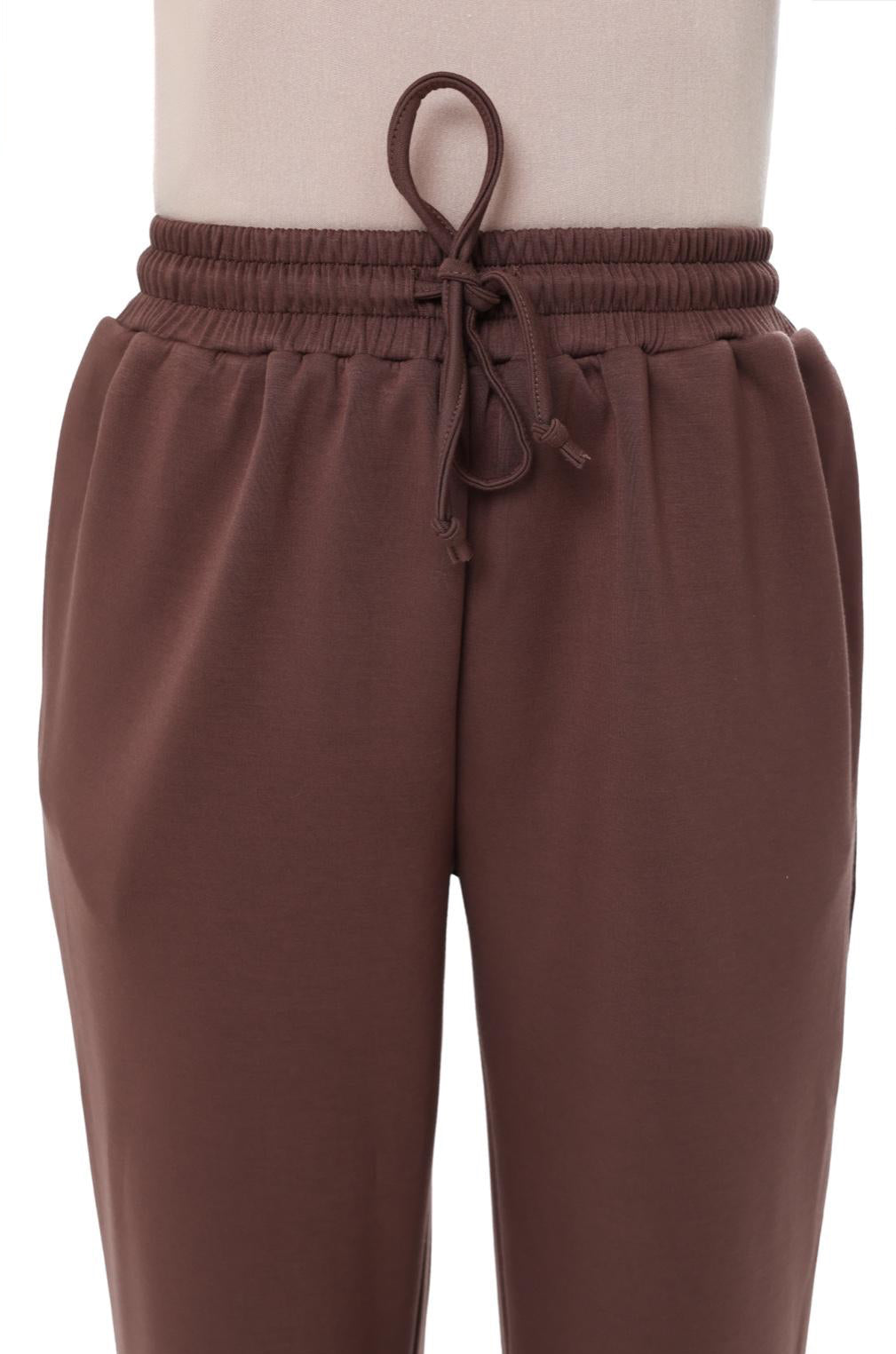 Close-up of the CHANO Comfy Pants in Mocha, showing the adjustable waistband and smooth cotton-blend texture.
