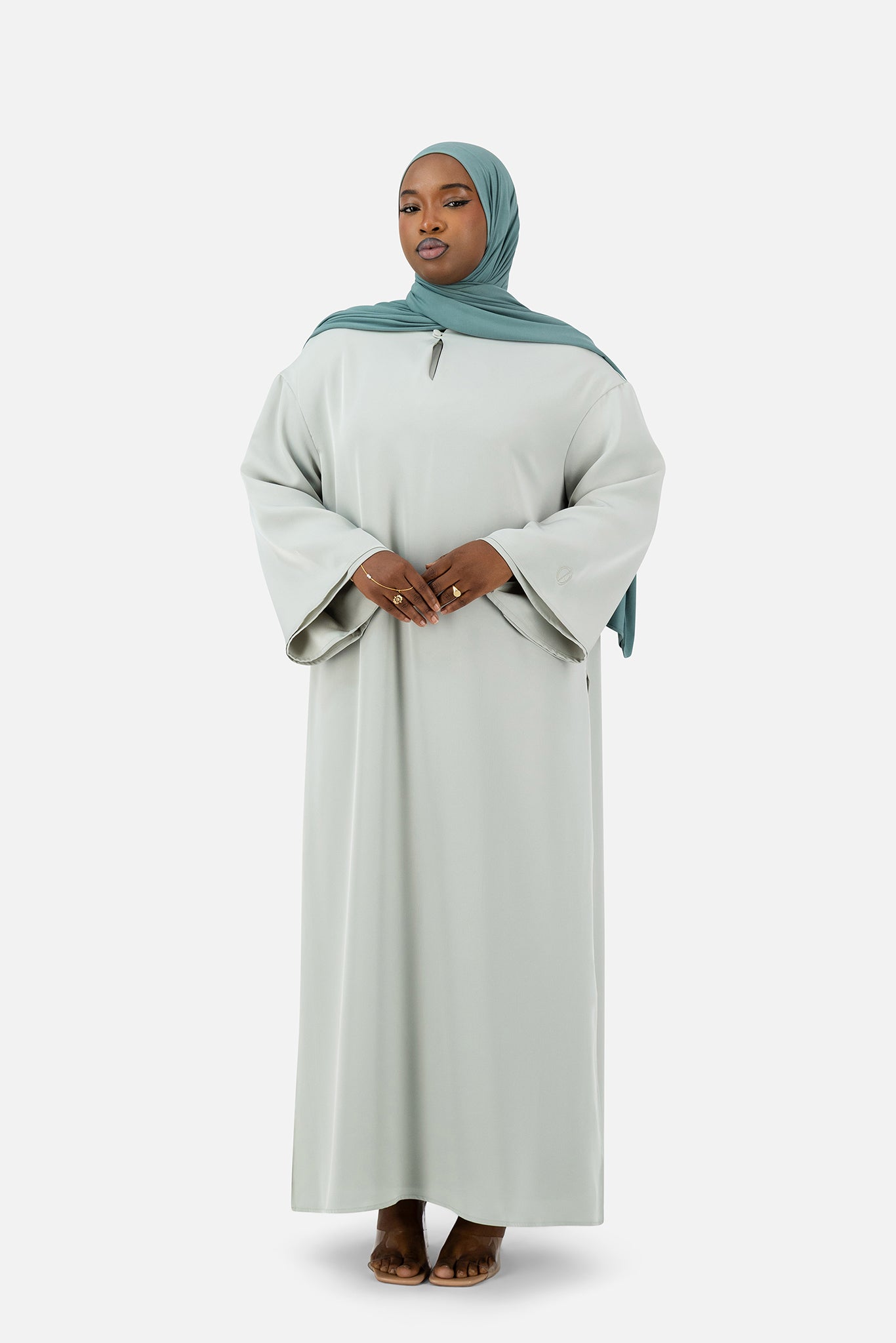 Modest layered abaya set in soft Misty Blue styled with matching hijab