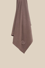 The CHANO breathable modal jersey hijab in taupe is made from premium modal. This hijab offers silky softness, breathability, and a luxurious feel. It’s gentle on skin and hair, helps prevent damage, and allows air to flow and keeps moisture away. With its natural drape, stretch, and non-slip quality, it’s easy to style and stays in place without an undercap.