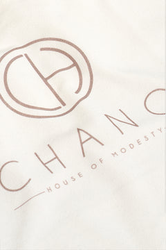This tote bag is made from durable recycled cotton canvas, the bag features a spacious main compartment with a wide opening.