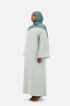 Elegant Misty Blue abaya set featuring layered details and relaxed fit