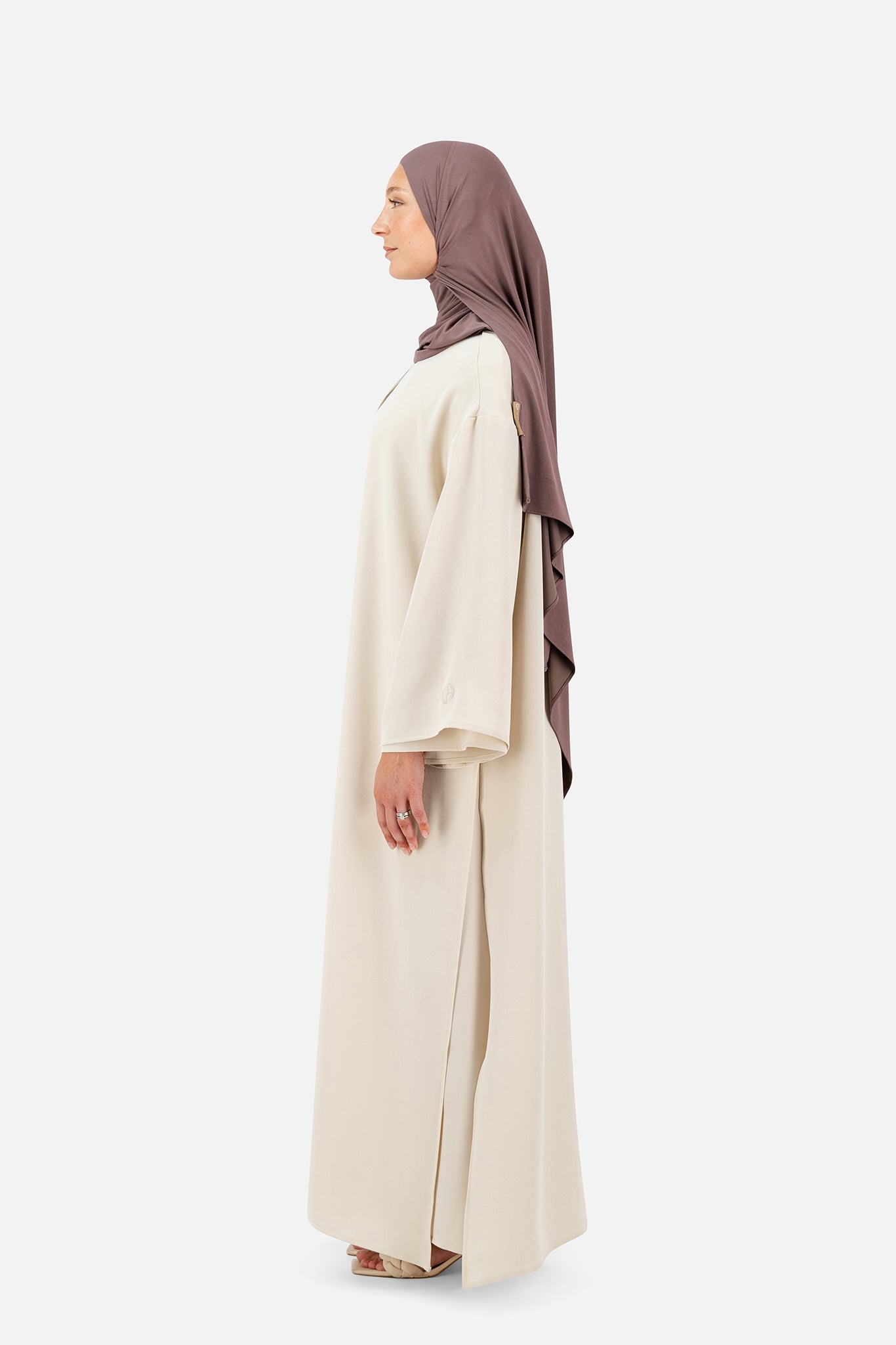 Elegant Rose Beige layered abaya set with relaxed fit and minimalist design