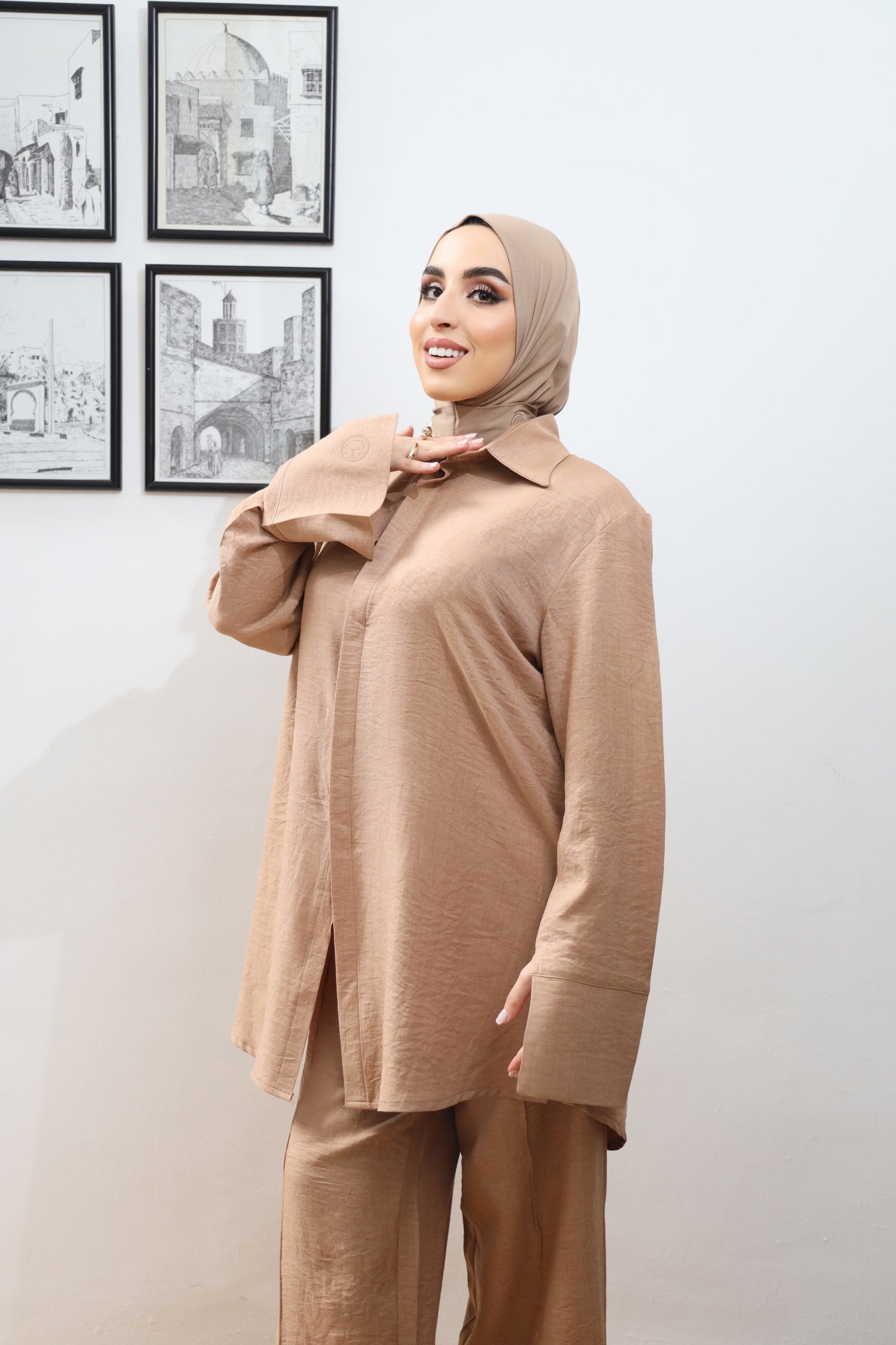 Close-up of caramel textured modest two-piece set featuring a structured collar and flared sleeves, styled with bamboo instant hijab – part of CHANO Modesty’s spring/summer collection.