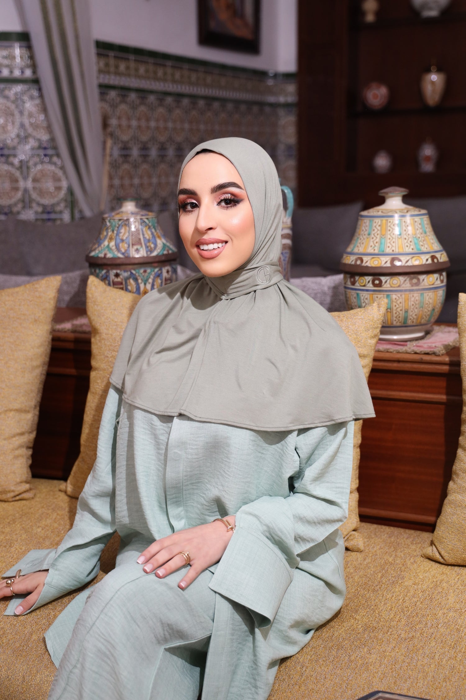 Model wearing the Instant Bamboo Hijab by CHANO Modesty in a sage green shade, paired with a matching modest co-ord set — lightweight, soft, and perfect for everyday wear.