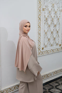 Model wearing CHANO Modesty’s Rosé Sand breathable modal jersey hijab, styled with a modest neutral-toned outfit for an elegant everyday look.