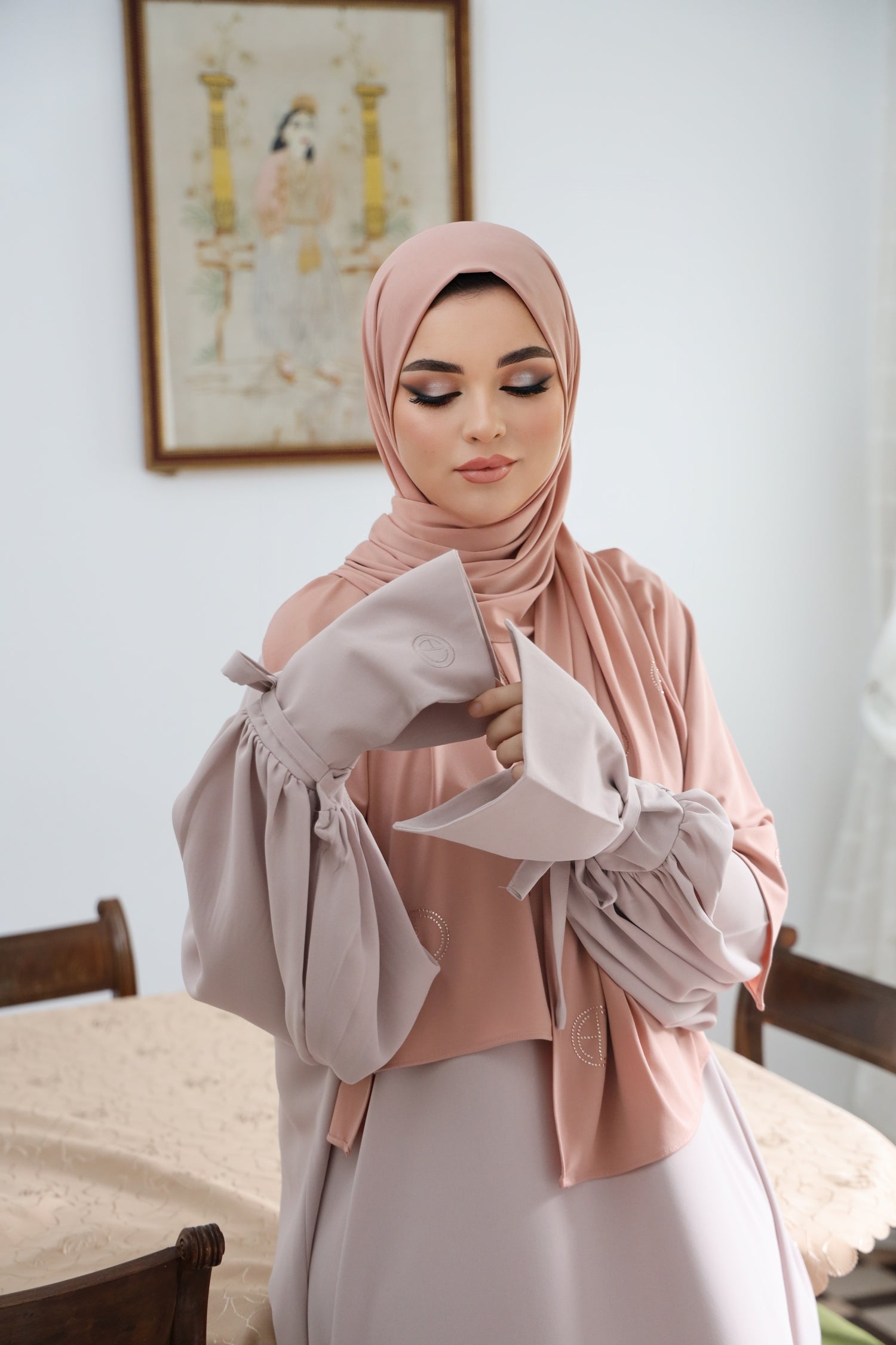 Close-up of the voluminous balloon sleeve on the CHANO Modesty dress in Dusty Rose, highlighting the soft fabric texture and gathered cuff detail.