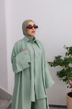 Close-up of CHANO Modesty’s pastel green Textured Kimono showcasing the sleeve detail and airy fabric — perfect for effortless, breathable modest style.