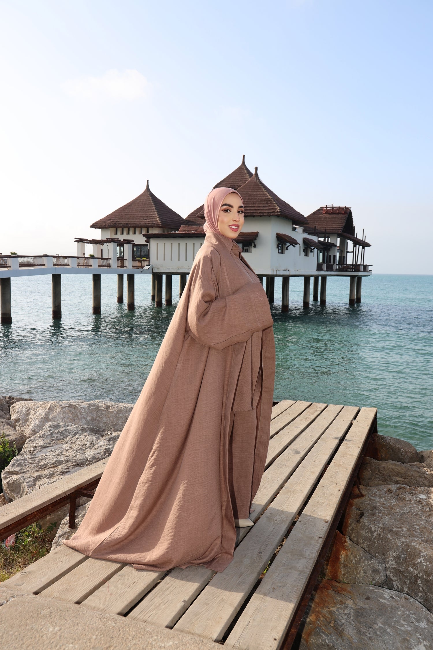 Model wearing CHANO Modesty’s Textured Kimono in a soft brown tone, styled with a matching co-ord set and hijab — lightweight, flowy and elegant for modest wear.