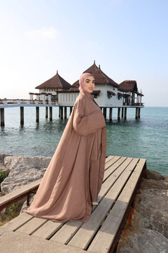 Model wearing CHANO Modesty’s Textured Kimono in a soft brown tone, styled with a matching co-ord set and hijab — lightweight, flowy and elegant for modest wear.