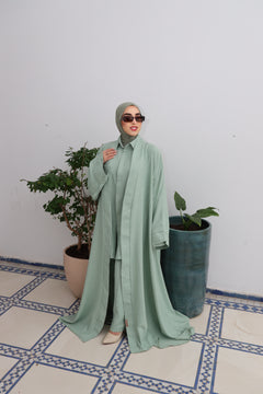 Model wearing CHANO Modesty’s Textured Kimono in a pastel green tone, styled with a matching co-ord set and hijab — lightweight, flowy and elegant for modest wear.