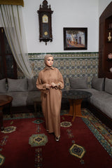 Model wearing CHANO Modesty’s Textured Tunic Dress in caramel, a relaxed modest fit with wide sleeves and a buttoned collar — perfect for effortless elegance.