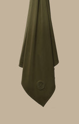 Close-up of the breathable modal jersey hijab in Olive Green with embroidered CHANO logo.