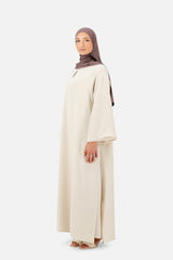 Layered abaya set in Rose Beige with flowing silhouette and elegant wide sleeves