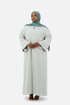 Modest layered abaya set in soft Misty Blue styled with matching hijab